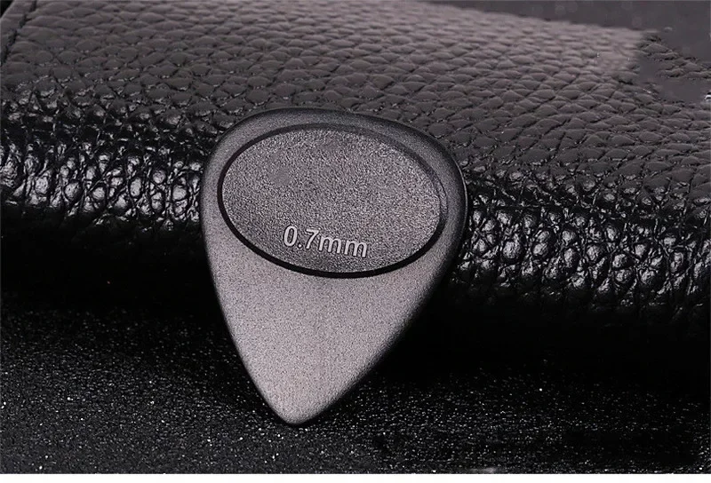 20 unids/lote 0,46/0,55/0,6/0,7mm púas de guitarra proyeccionando púas eléctricas acústicas de nailon púas accesorios de instrumentos musicales - imagen 4