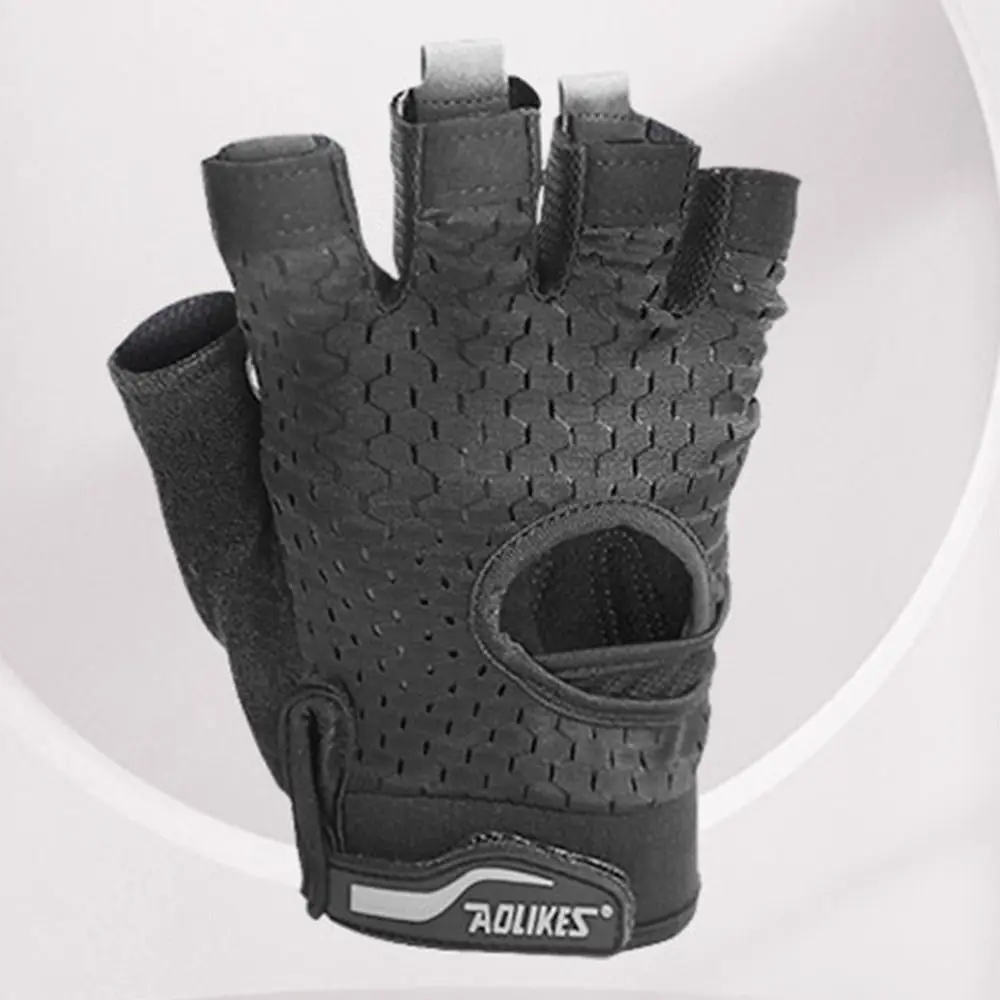 Mejora el agarre y la comodidad con este elegante guante negro sin dedo