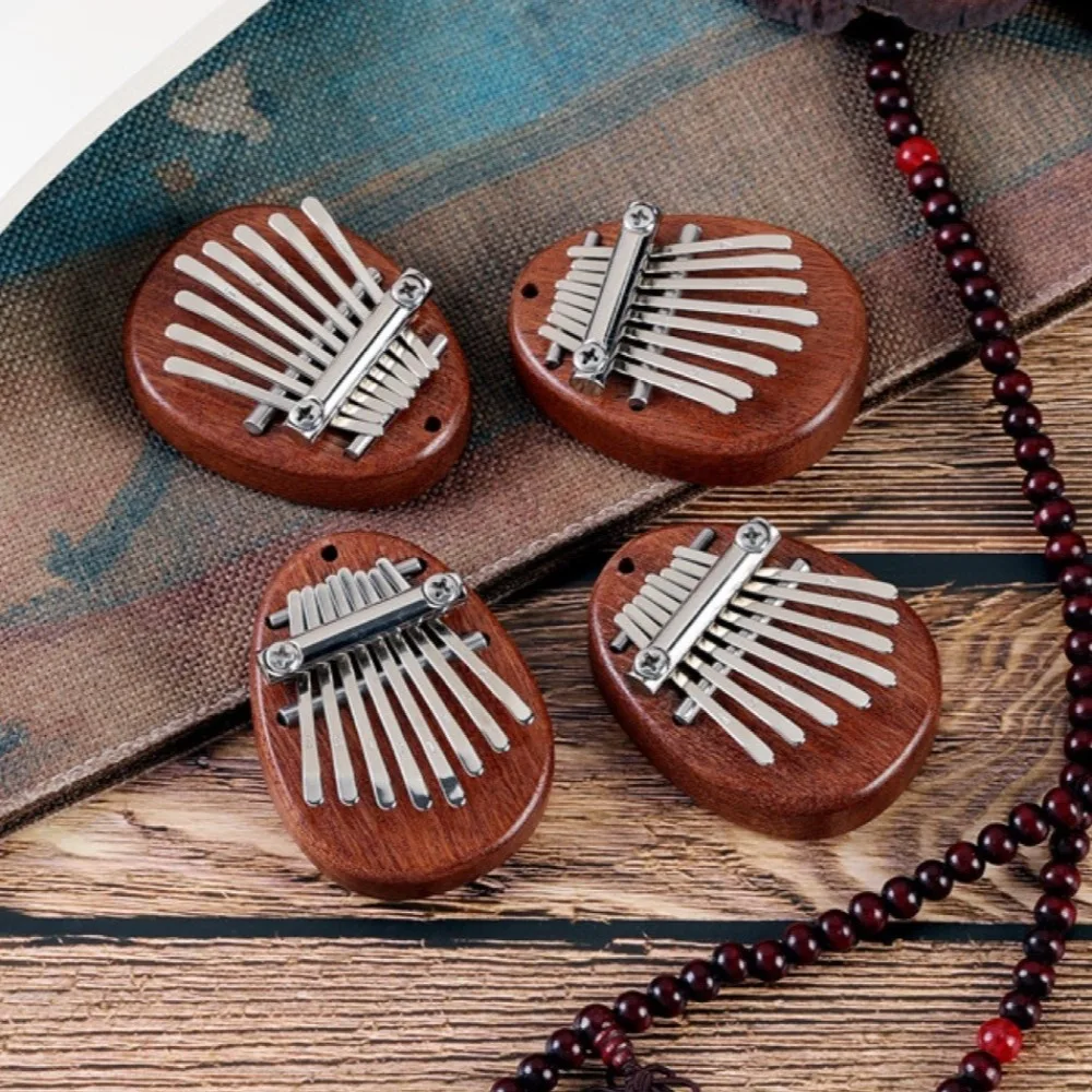 Mini Piano de dedo con arpa para dedos, fácil de aprender, exquisito, 8 teclas, regalo Kalimba, Piano de mano Marimba para principiantes - imagen 2