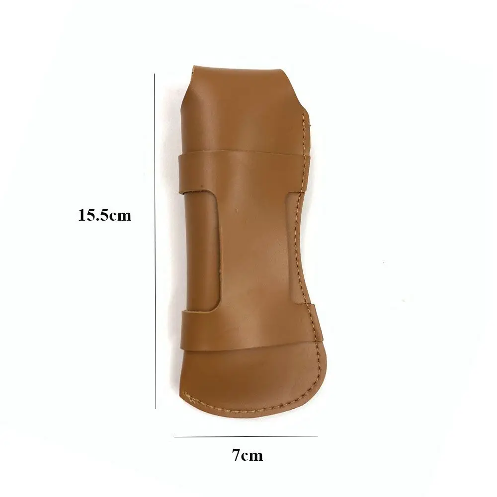 Una caja de cuero marrón con una medición de 15 cm