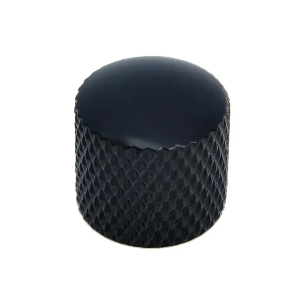 una perilla negra con superficie texturizada