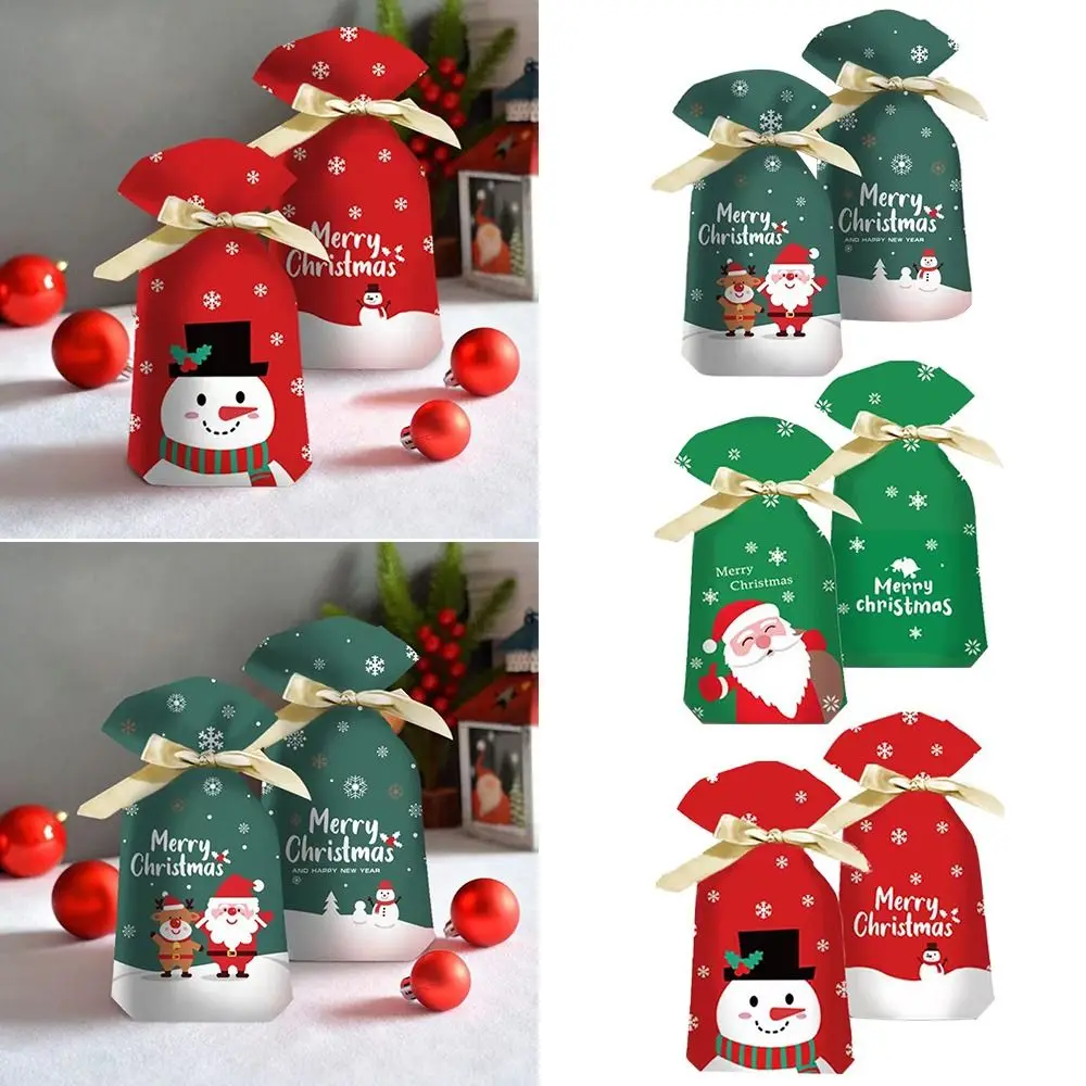 Bolsa de regalo de Feliz Navidad para niños, paquete de dulces de plástico de favores de fiesta con alambre de corbata, bolsas de envoltura de galletas de Feliz Año Nuevo, 50 piezas - imagen 2