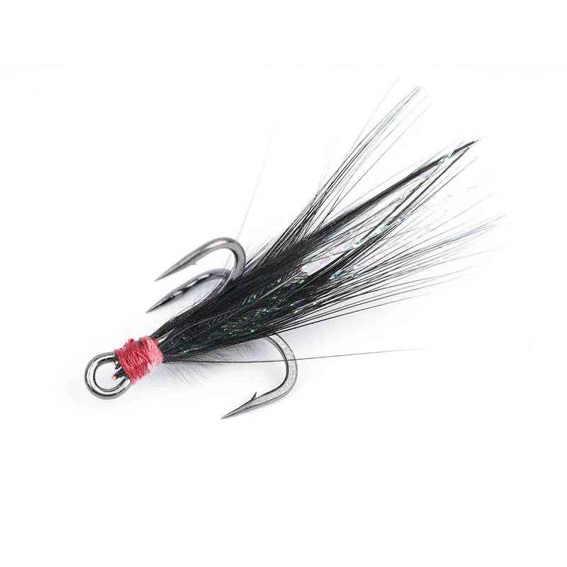 Detalle del anzuelo triple con pluma
