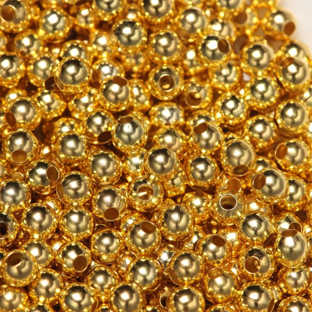 Cuentas doradas un símbolo de elegancia y artesanía