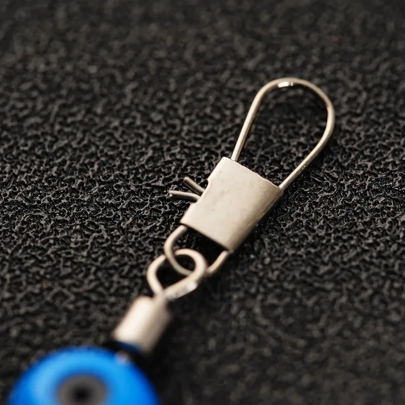 100 unids/lote pesca flotante frijoles espaciales girar conectores Bobber pesca en el mar aparejos de agua salada equipo giratorio señuelo de Metal - imagen 5