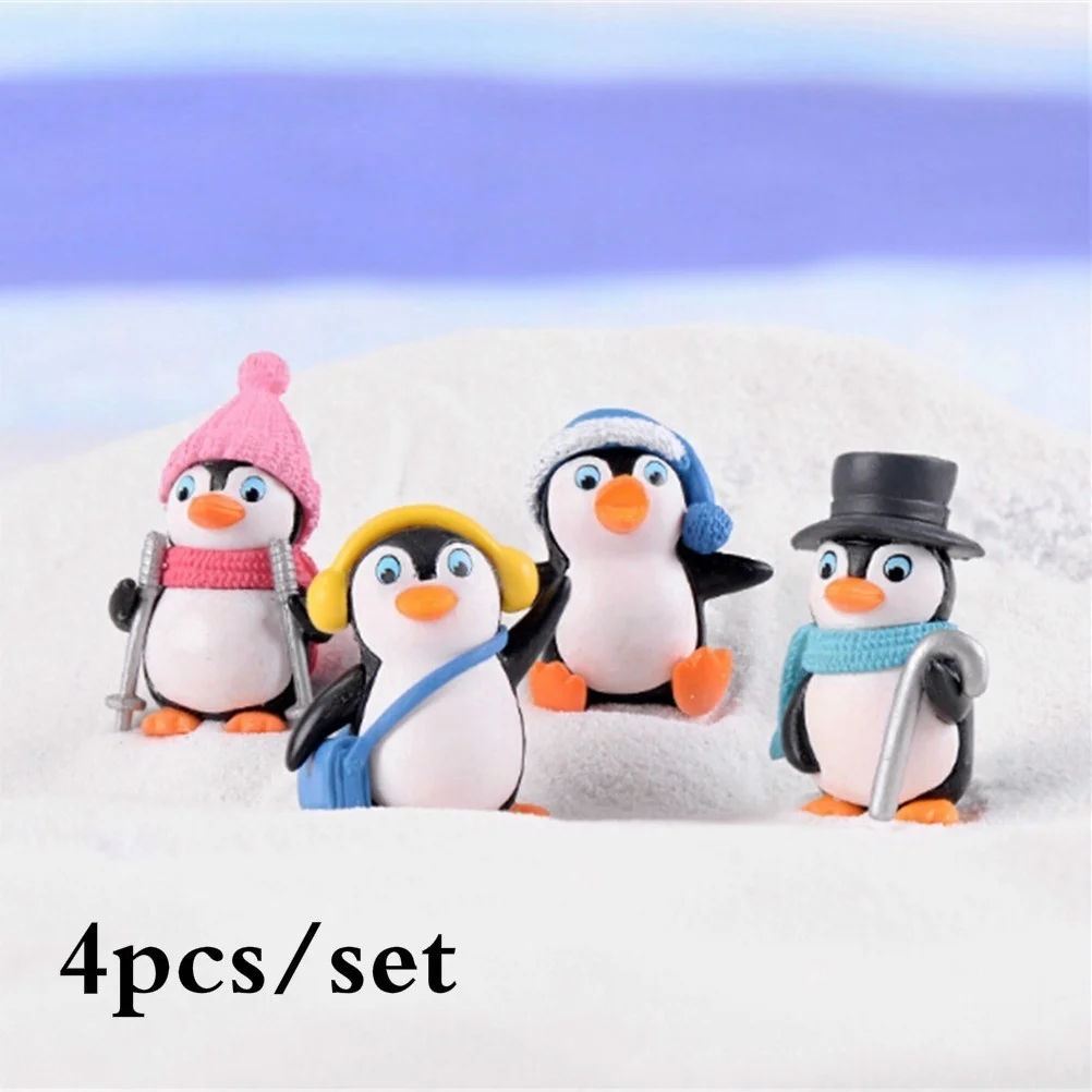 Adorables figuras de pingüinos vestidos con atuendo de invierno para una exhibición divertida y acogedora