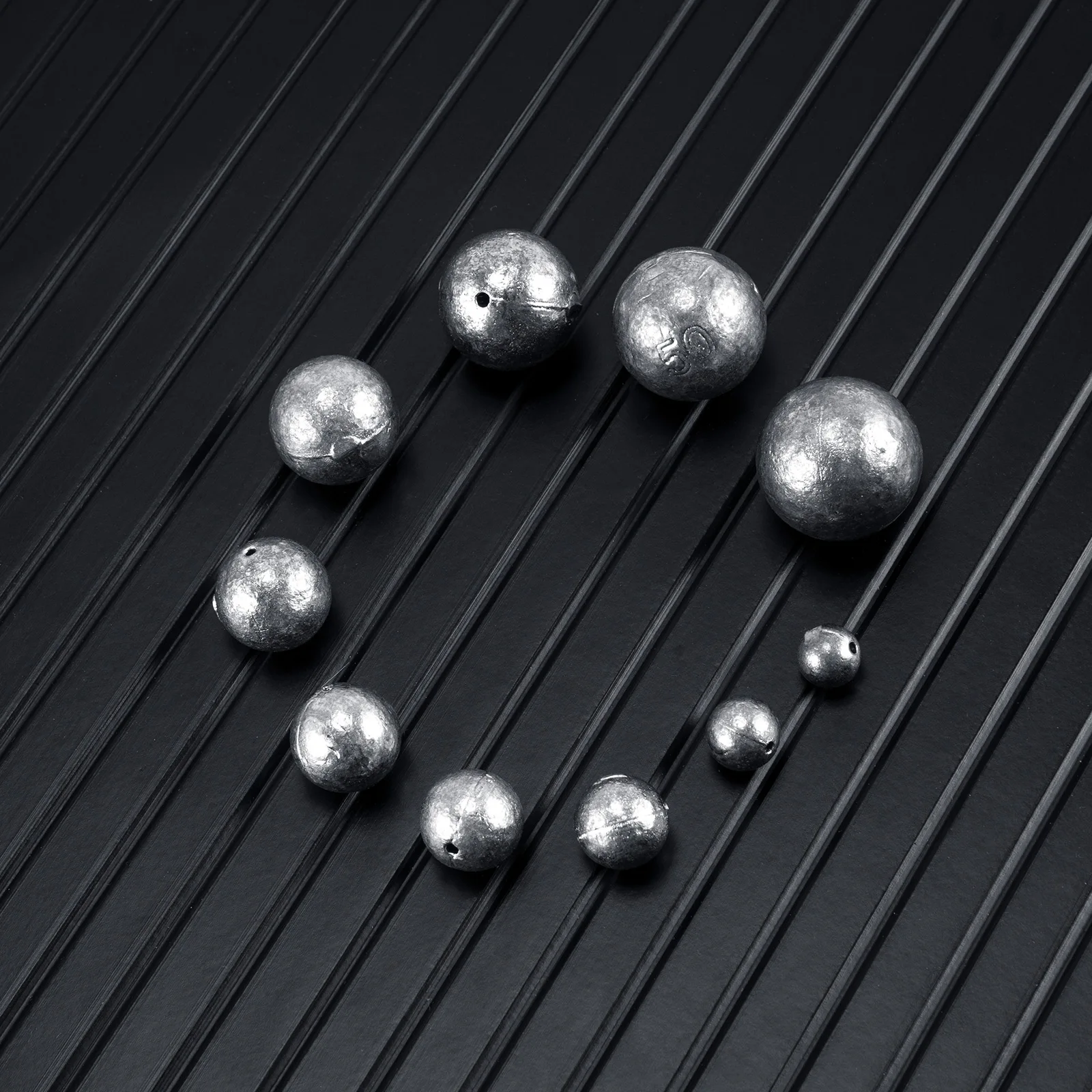 Plomada de peso de pesca de bola redonda perforada en línea para correr, aparejo de plomo de fundición larga, cabezal plano de pesca, platillo de besugo de bacalao - imagen 4