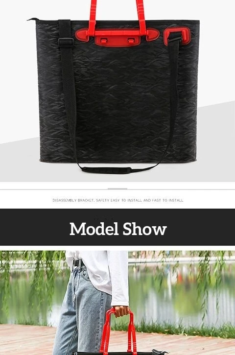 Una bolsa negra con una manija roja y correa