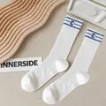 white mid-tube sock