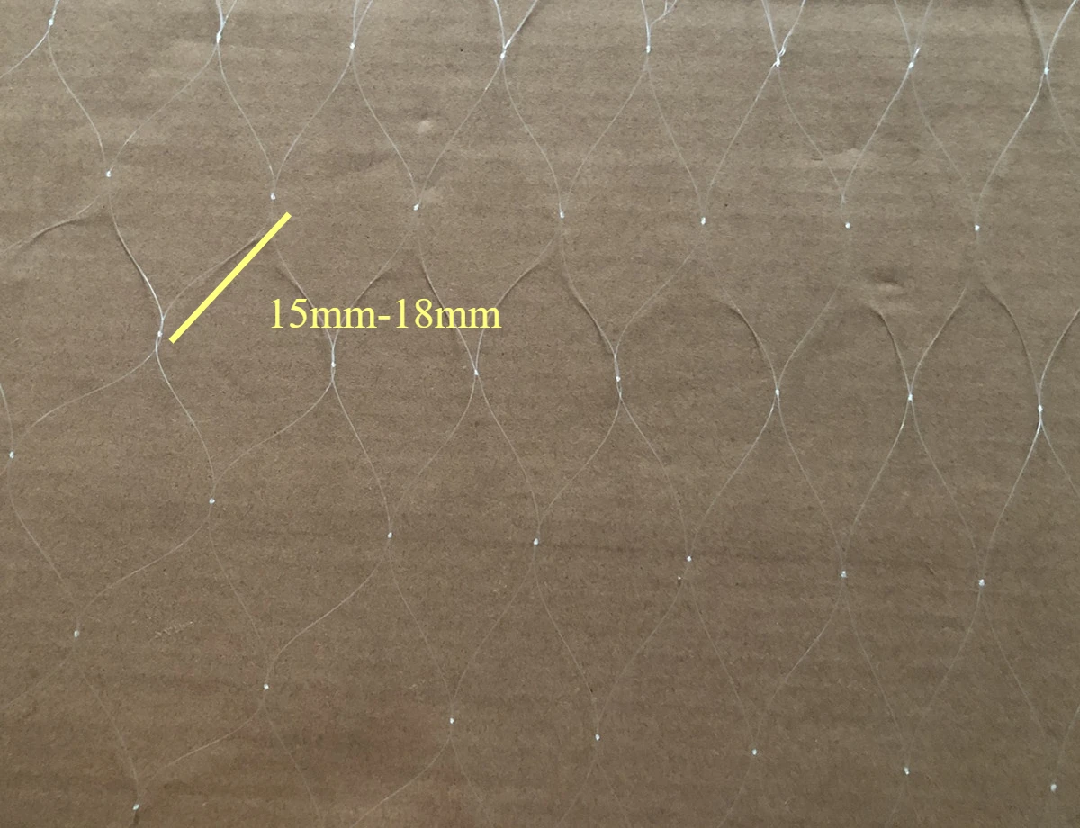 Un papel marrón con una línea amarilla y 15 mm-18 mm escrito en él