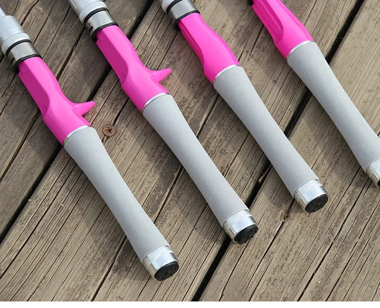 Elegantes cañas de pesca rosa y gris para aventuras al aire libre
