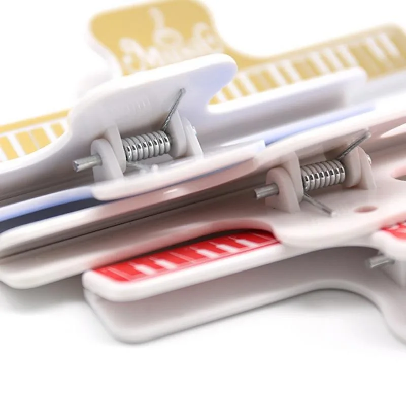 Clip de hoja de música ABS de 15cm, 4 colores, soporte de libro, puntuación de música, Clips fijos para Piano, guitarra, violín, violonchelo, práctica de rendimiento - imagen 5