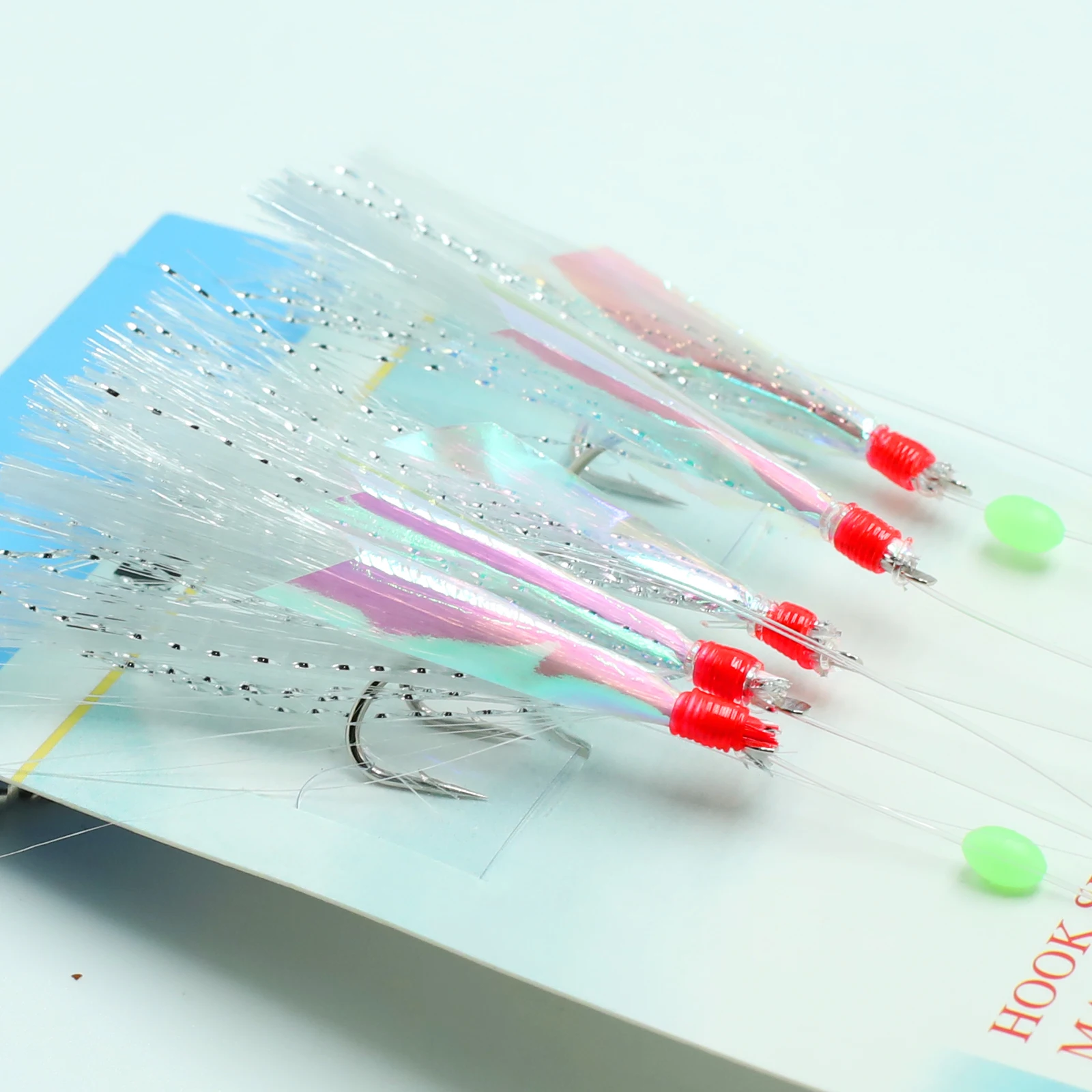 TAKBAS 1/3/5 Paquetes de aparejos Sabiki para agua salada, aparejos de plumas de caballa con piel de pez láser, aparejos de pesca marina preatados con cuentas luminosas, señuelos de insectos voladores biónicos - imagen 4