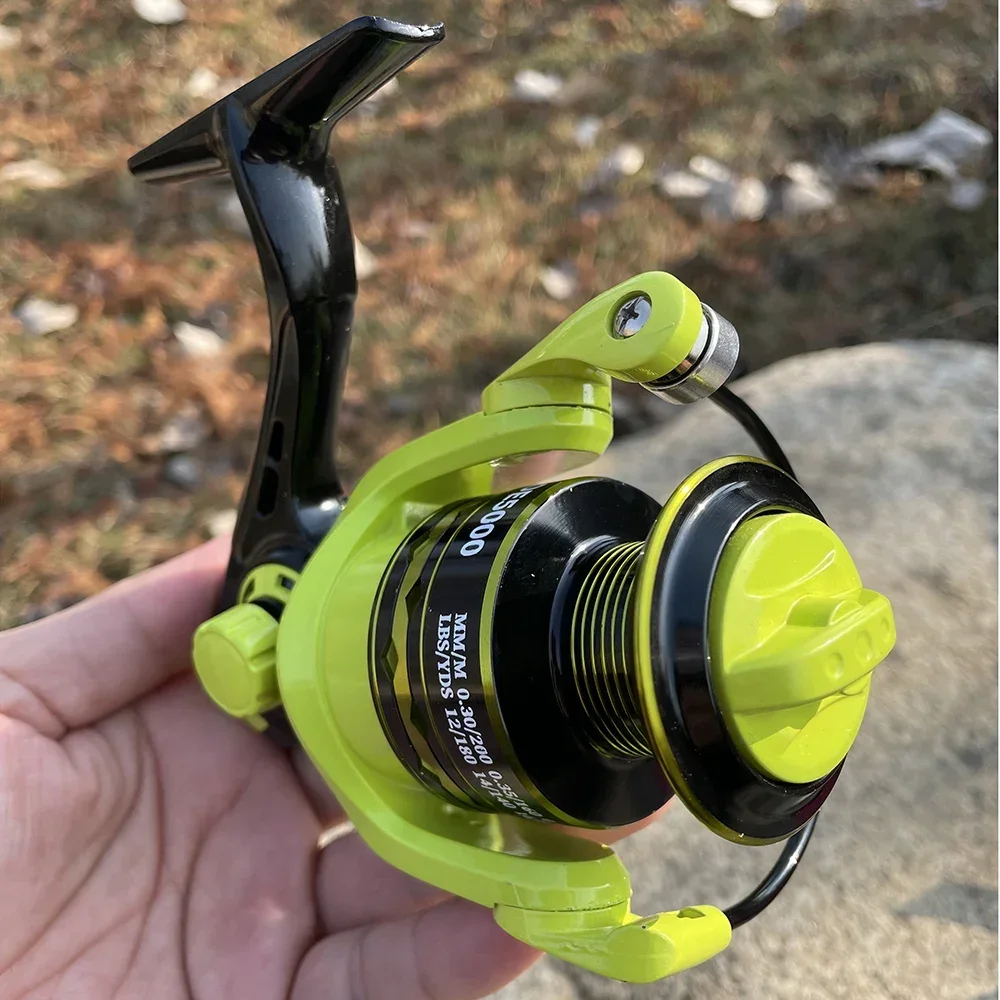 Carrete de pesca giratorio de alta calidad, Serie 2000-7000, 5,2: 1, carrete de Metal de alta velocidad, arrastre grande de 10KG con línea trenzada de 100M - imagen 5