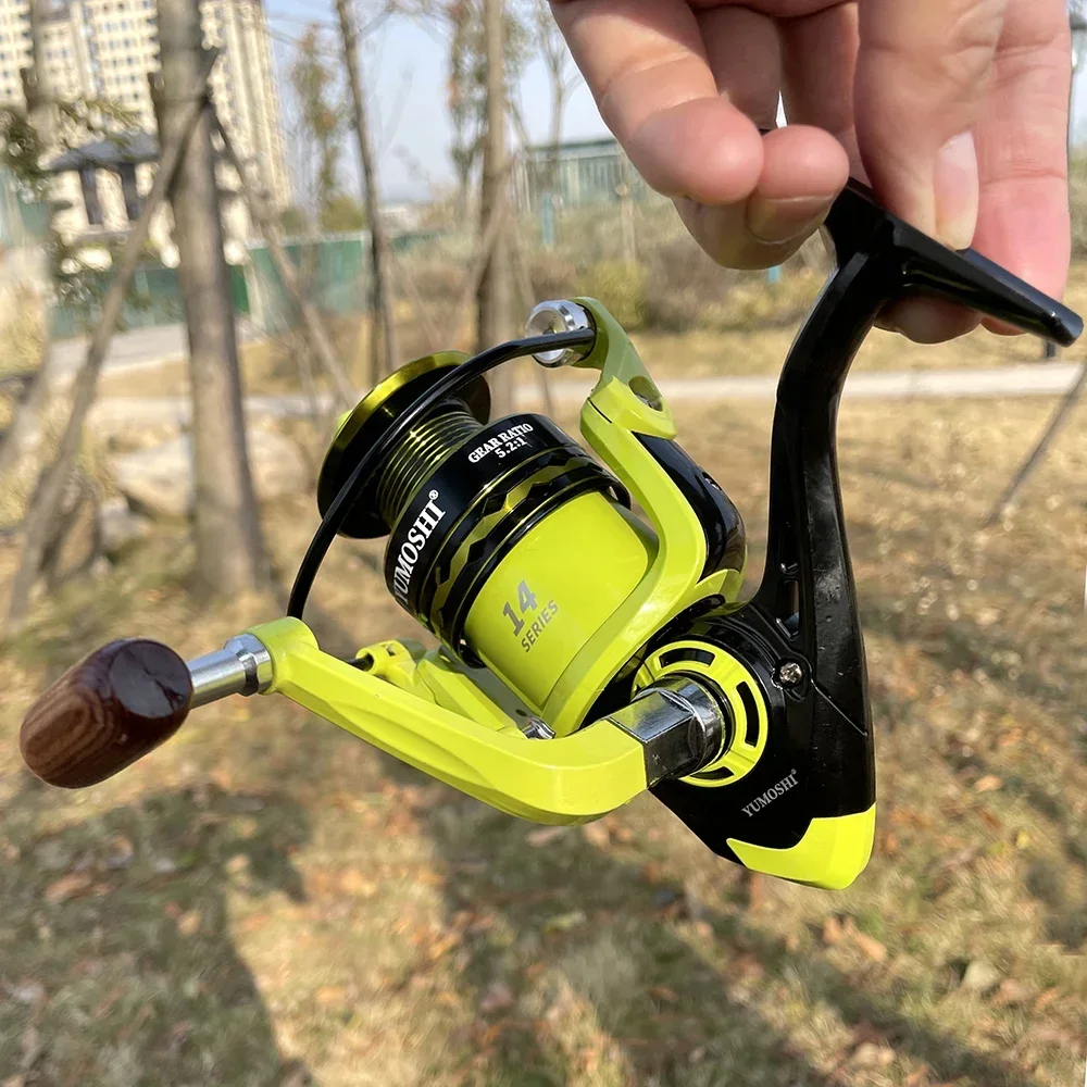 Carrete de pesca giratorio de alta calidad, Serie 2000-7000, 5,2: 1, carrete de Metal de alta velocidad, arrastre grande de 10KG con línea trenzada de 100M - imagen 4