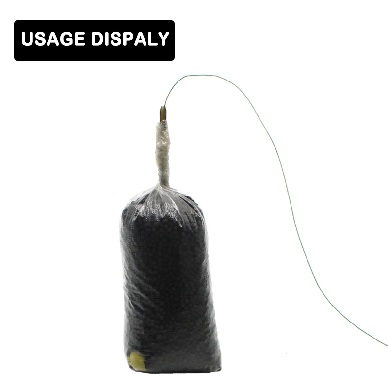 Una bolsa negra con un alambre verde que se extiende desde la "pantalla de uso" etiquetada para su uso potencial en un producto o servicio