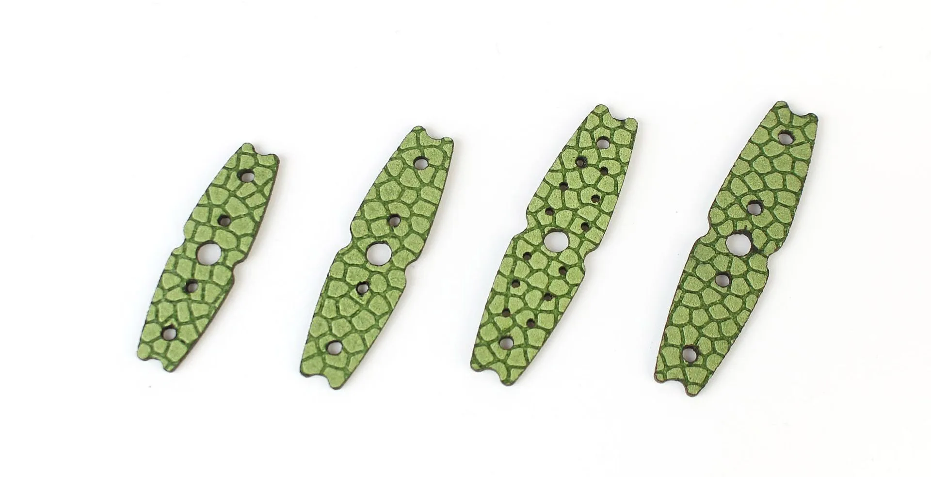 Estos componentes texturizados verdes están diseñados para aplicaciones versátiles