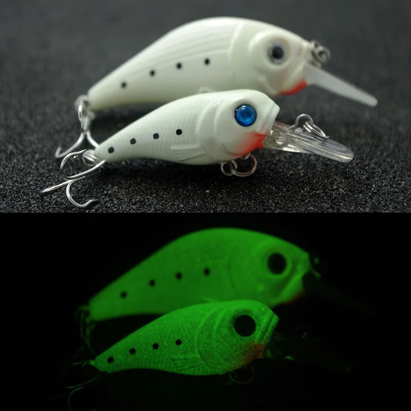 Un señuelo de pesca blanca con luz verde