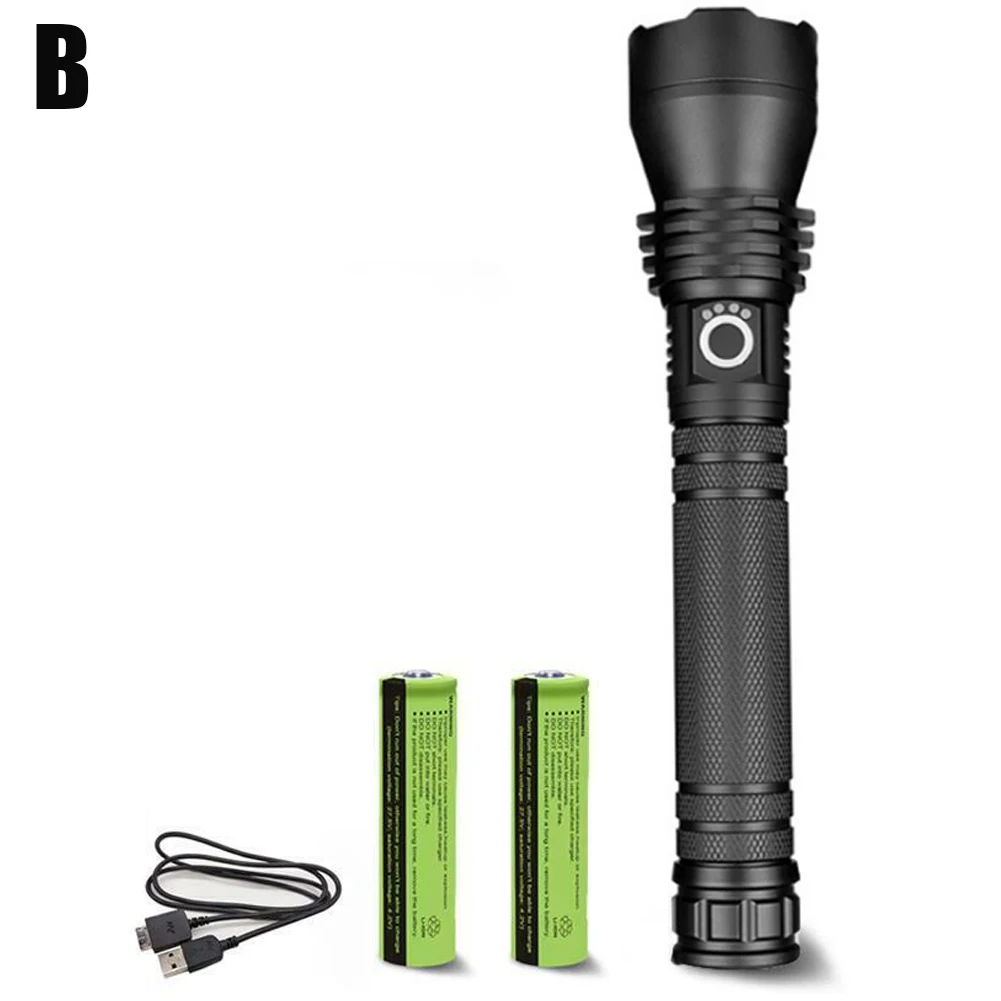 Una linterna negra con dos baterías verdes