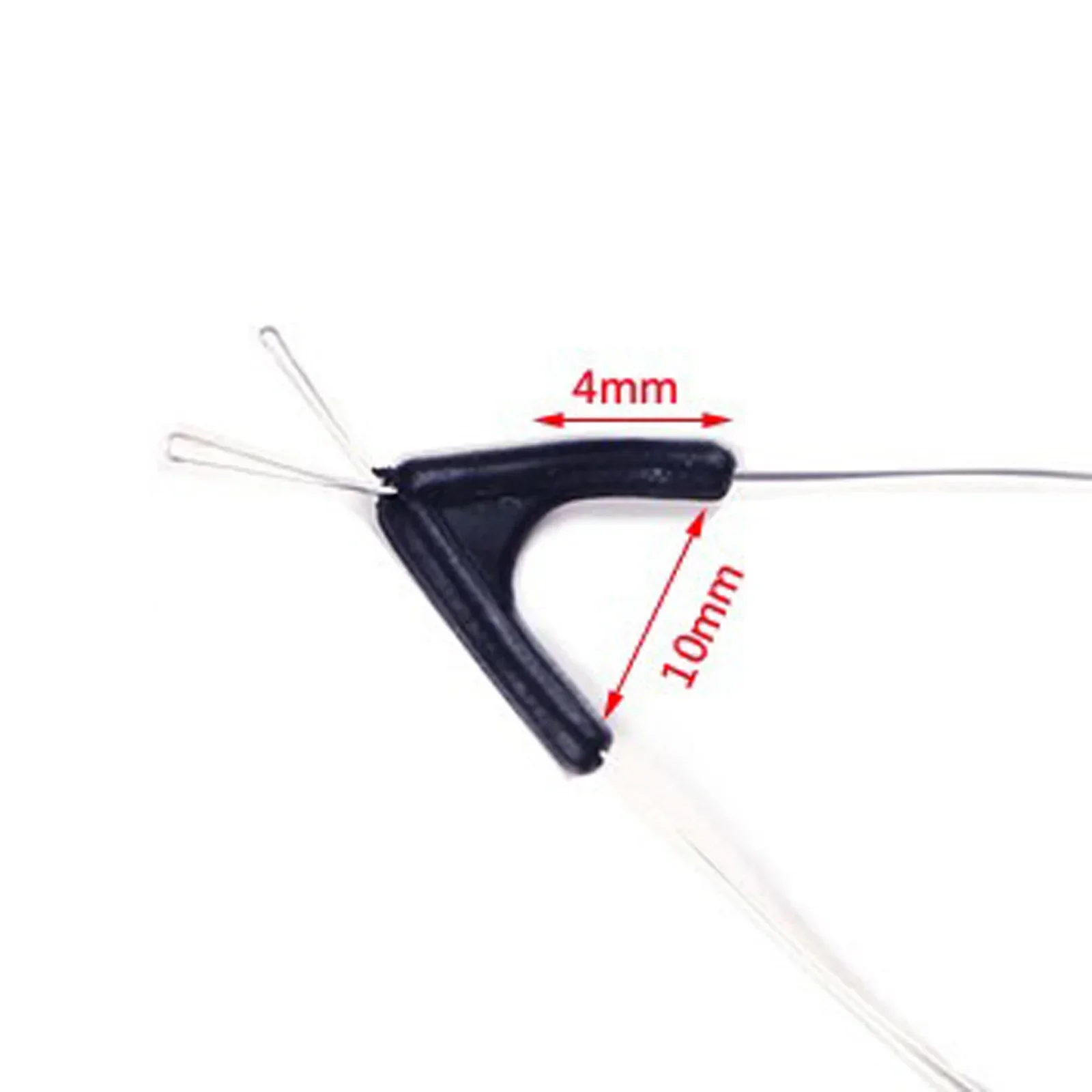 Una imagen en blanco y negro de un par de tijeras con una medición de 4 mm