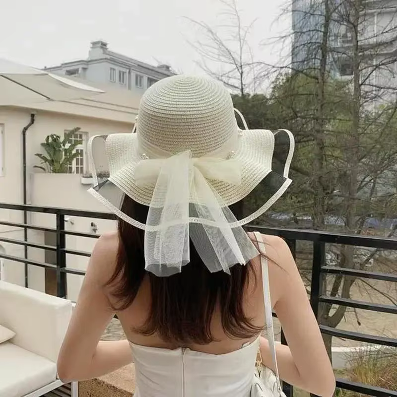 Nuevo sombrero plegable de ala ancha para el sol con perlas de paja para niña, sombrero ondulado para la playa, sombrero de viaje con protección UV, sombrero de playa para mujer, regalo de cumpleaños - imagen 2