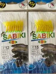 Aparejo Sabiki con vinilos amarillos y anzuelos dorados para mar