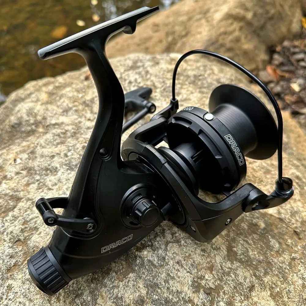 Carrete de pesca giratorio de carpa, carretes de fundición suave de doble freno, serie 9000-12000, carretes de larga distancia de arrastre máximo de 20KG para todas las aguas