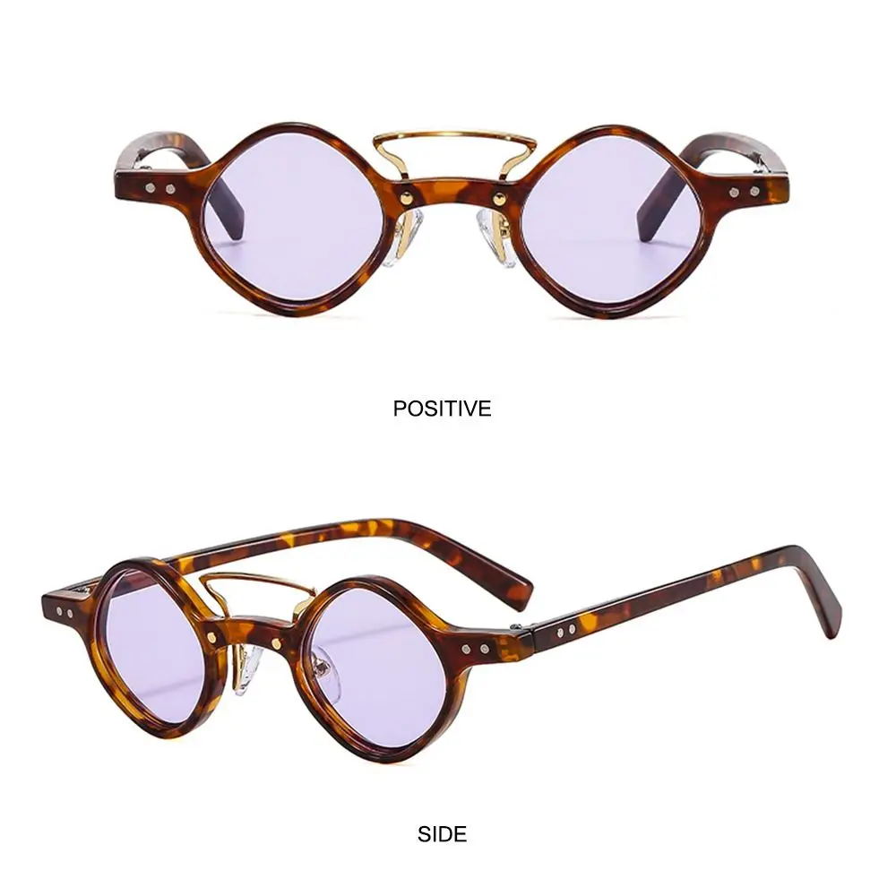 Gafas de sol redondas elegantes con marcos de pistola de tortuga y lentes morados