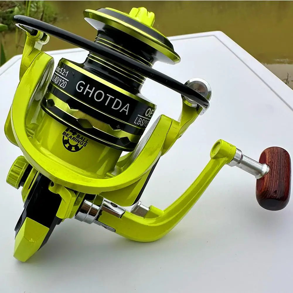 Carrete de pesca con alimentador de carpa serie OE2000-7000, carrete de Metal de agua dulce y salada, arrastre de cuerpo de Metal duradero de 8KG para principiantes/niños - imagen 4