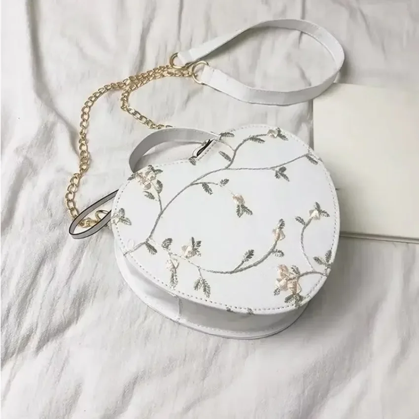 Bolsos redondos de corazón de encaje para mujer, bandolera de cuero de PU, bolso cruzado en forma de corazón para primavera y verano - imagen 4