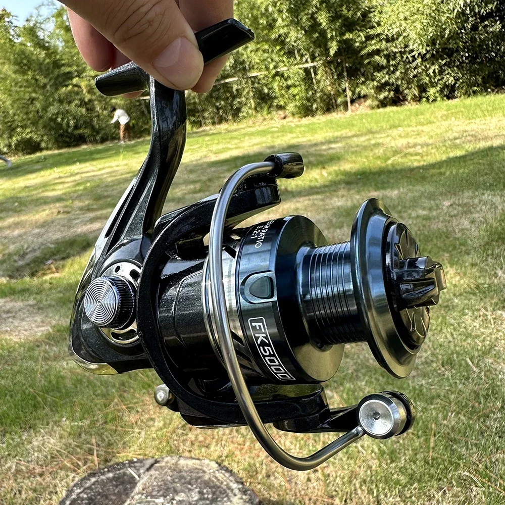 Carrete de pesca con carrete de Metal, rueda giratoria de 8kg de arrastre máximo para agua salada, plantilla de mar, bobina de pesca de carpa, serie de FK2000-7000 rápida - imagen 4