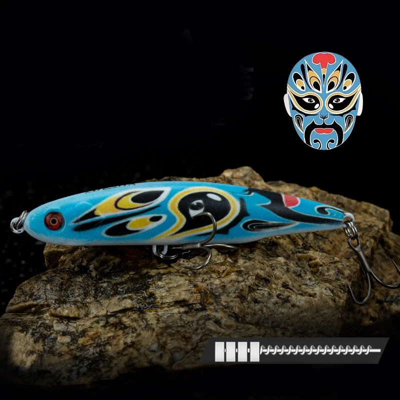 Un señuelo de pesca azul y negro con una máscara