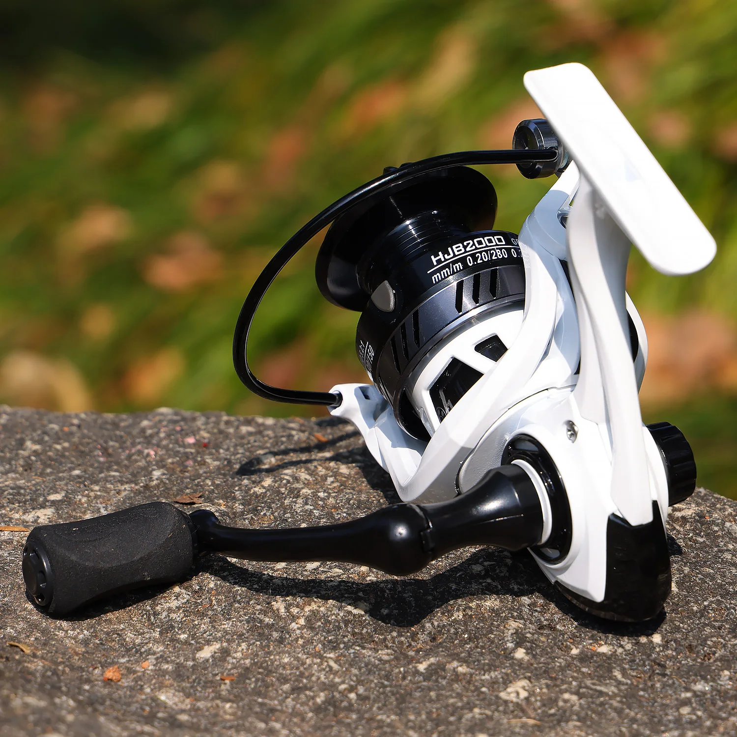 Carretes de Pesca Giratorios Sougayilang 2000-3000, Carretes de Pesca con Mango de EVA, Relación de Velocidad 5.2:1, Arrastre Máximo de 8 kg con Regalos Misteriosos - imagen 5