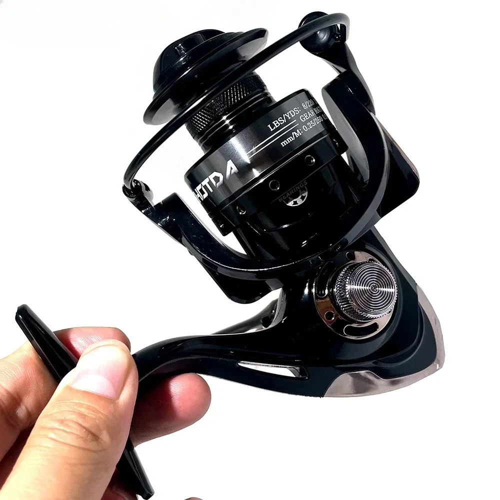 Carrete de pesca giratorio serie 2000-7000 con alarma de picadura de pescado 5,2: 1 carrete de pesca de carpa de alta velocidad línea de Metal taza aparejos de pesca de mar - imagen 4