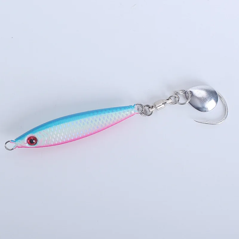 Señuelo de pesca colorido con una ruleta metálica para atraer peces