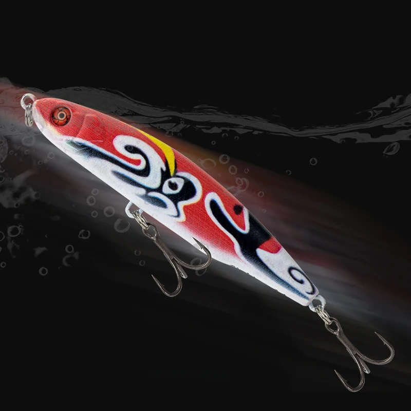 Un señuelo de pesca con un diseño rojo y blanco