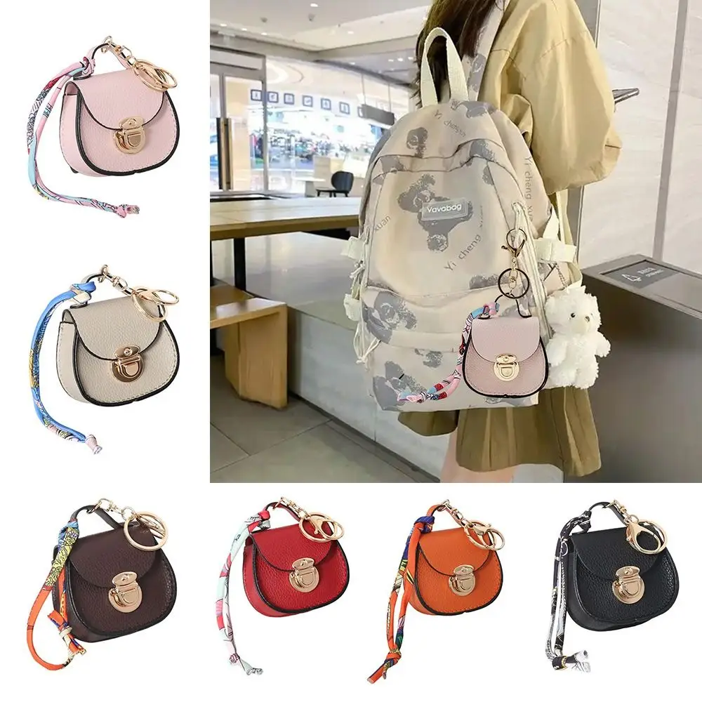 Llavero portátil, monedero pequeño, bolso multifunción de cuero de primera calidad para auriculares, Mini bolsa de almacenamiento para mujer - imagen 2