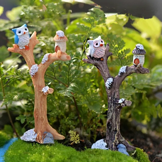 Mini ramas de árbol usadas en decoración de jardín con hadas