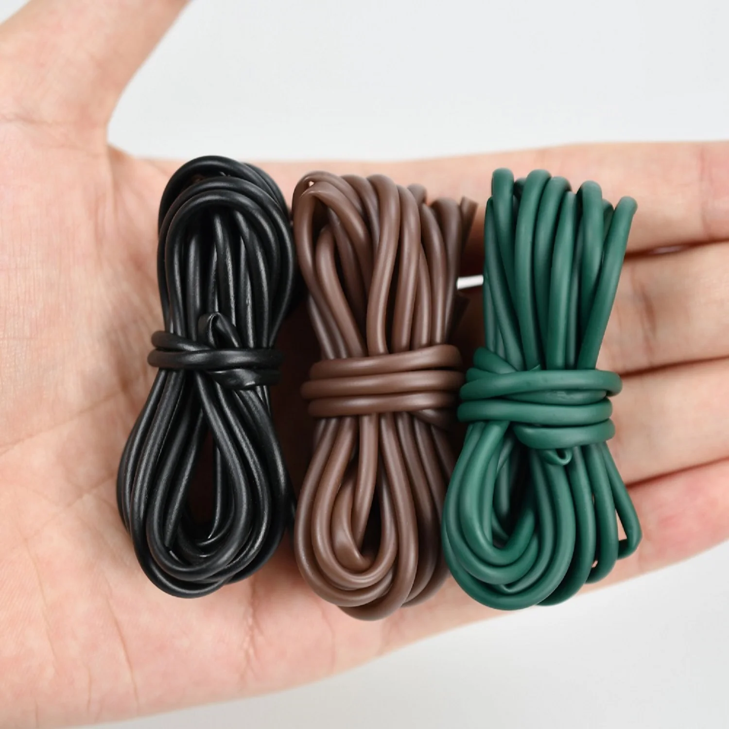 Manguera antienredos verde para pesca de carpa