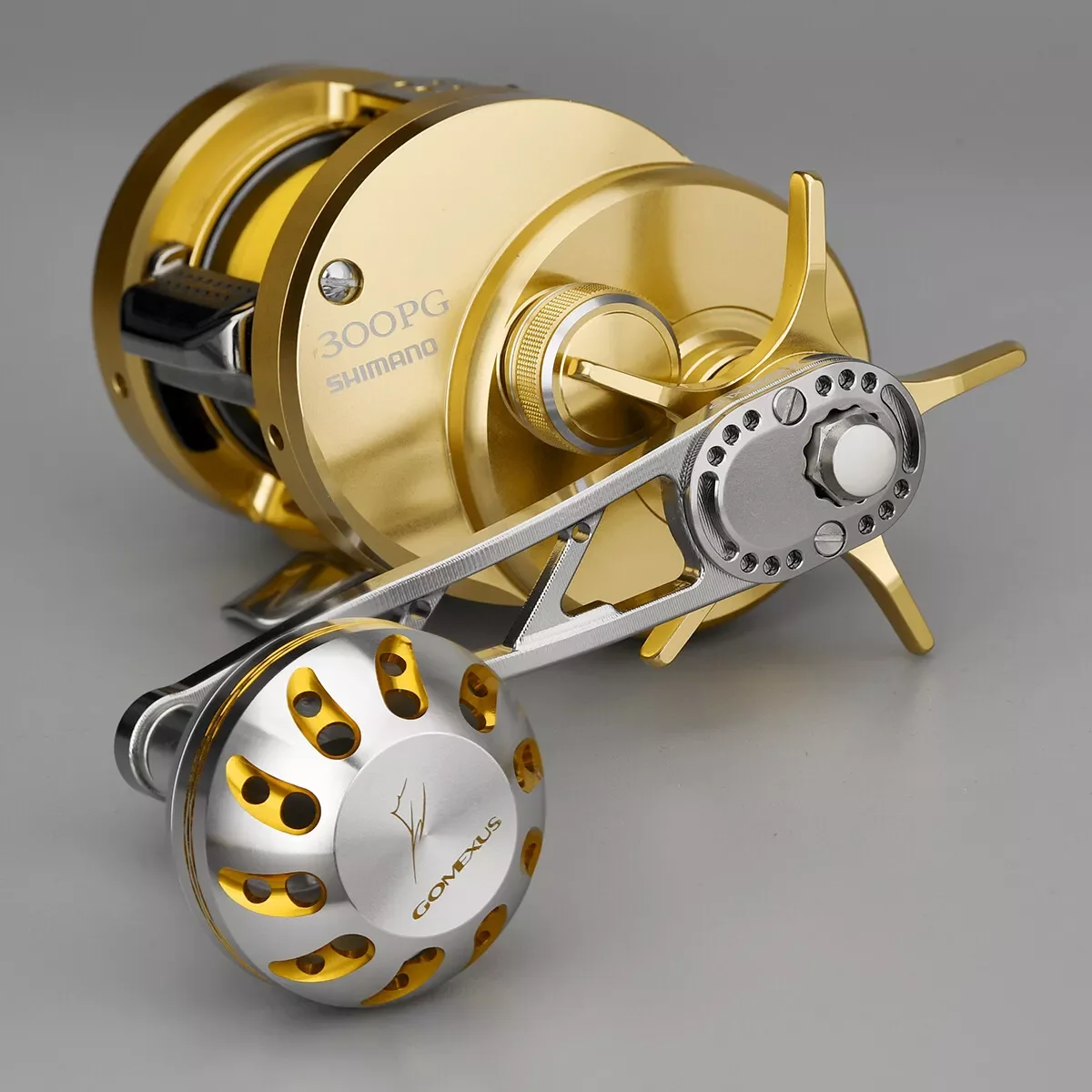 GOMEXUS Power Handle 8x5mm para Shimano Tranx 300 400 Daiwa Lexa Coastal Reel 75mm Color plata dorado
