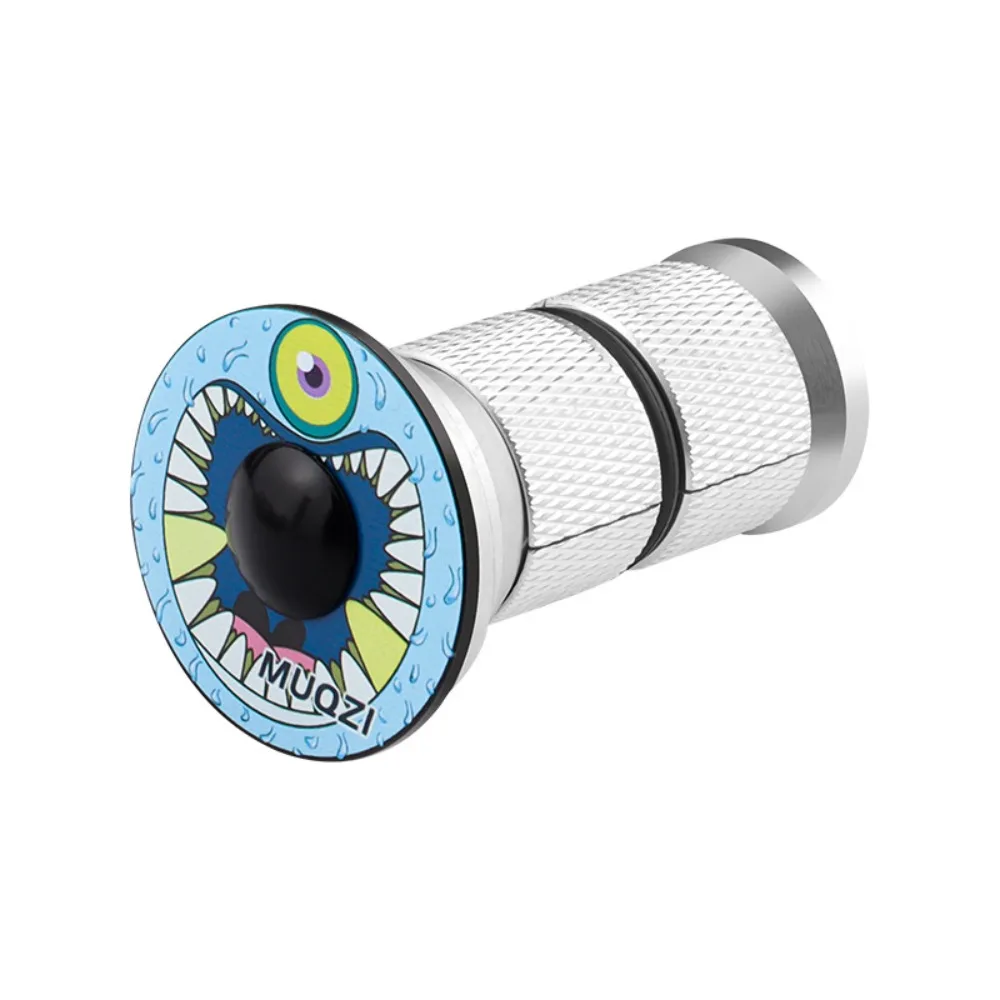 Un objeto negro y azul con una cara monstruosa