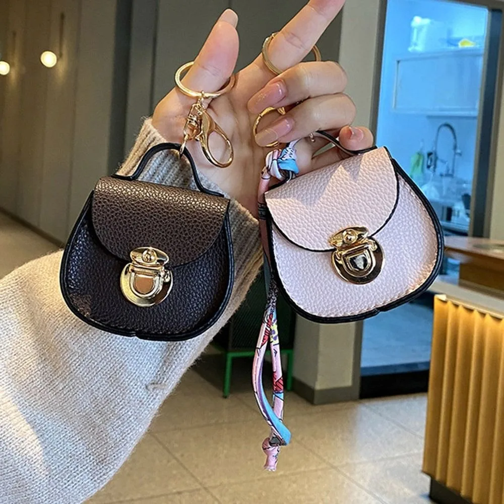 Llavero portátil, monedero pequeño, bolso multifunción de cuero de primera calidad para auriculares, Mini bolsa de almacenamiento para mujer - imagen 3