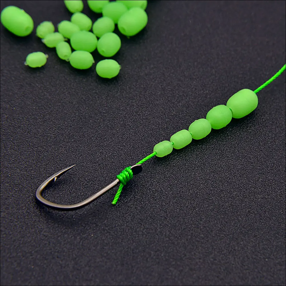 Linoriver 100 Uds. Luminoso verde pesca cilíndrica cuentas de goma suave anzuelo de pesca aparejos de señuelo accesorios tapón brillante frijoles - imagen 4