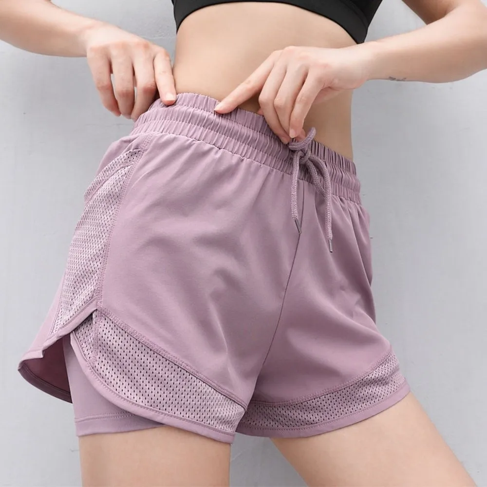 Pantalones cortos de Yoga holgados y cómodos para mujer, mallas deportivas de malla con realce de glúteos y bolsillo, ropa interior deportiva transpirable para correr - imagen 3