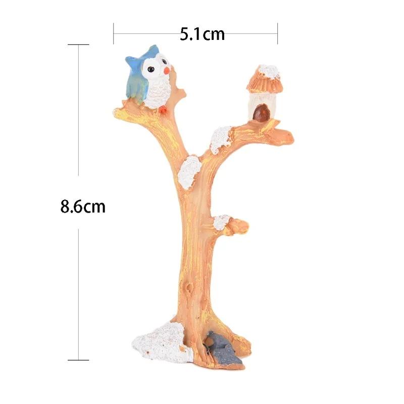 Miniatura de rama de árbol con búho y hada en resina