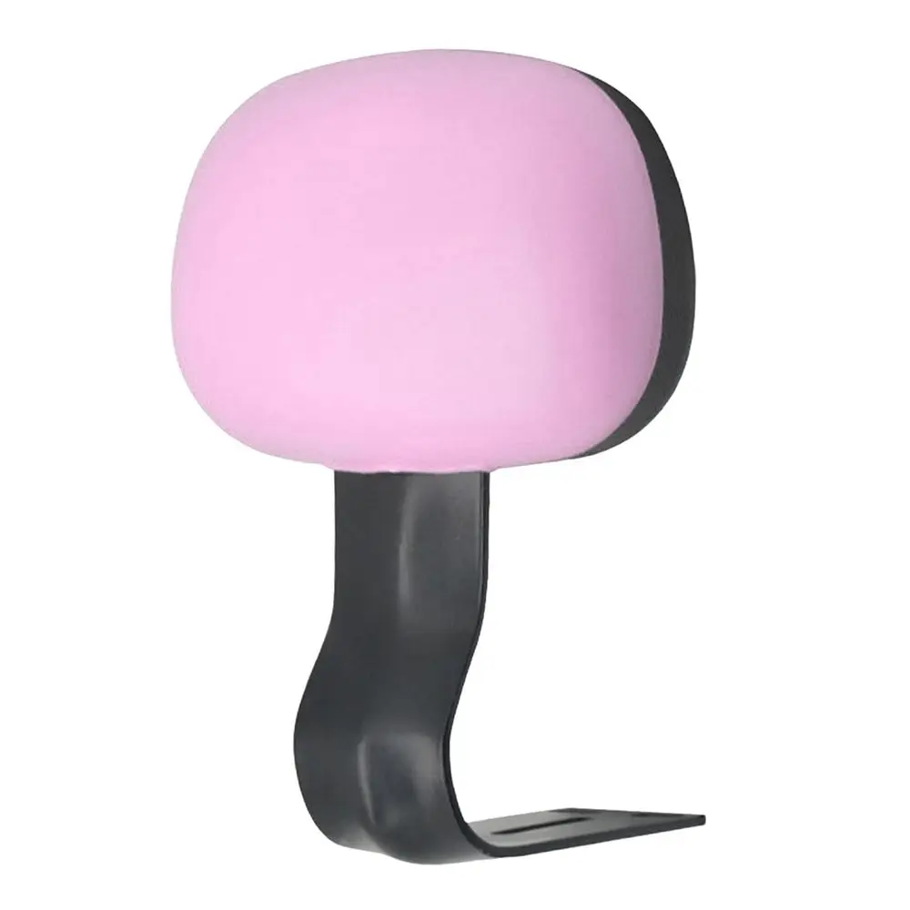 Un reposacabezas ergonómico rosado y negro diseñado para la comodidad y el soporte