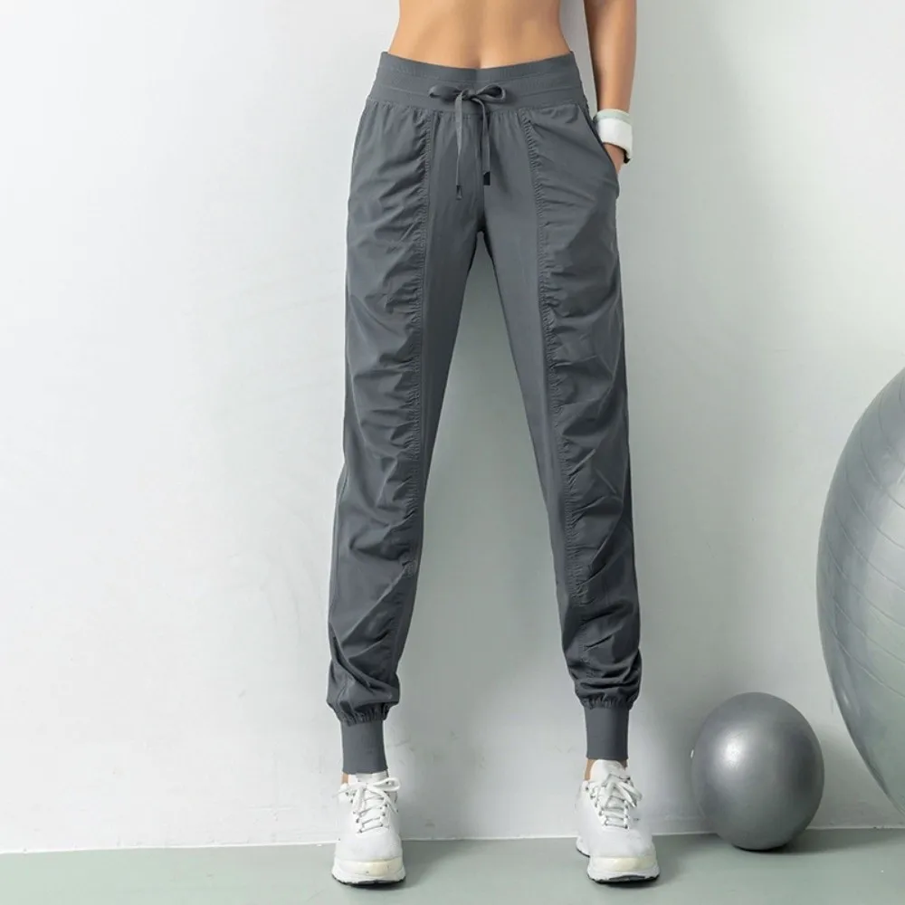Ropa deportiva Pantalones para correr arrugados Pantalones largos cónicos de yoga Pantalones elásticos de cintura alta Fitness