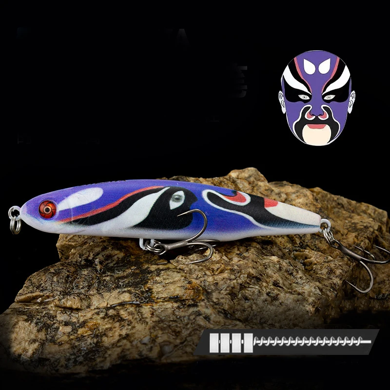 Un señuelo de pesca con un diseño morado y azul