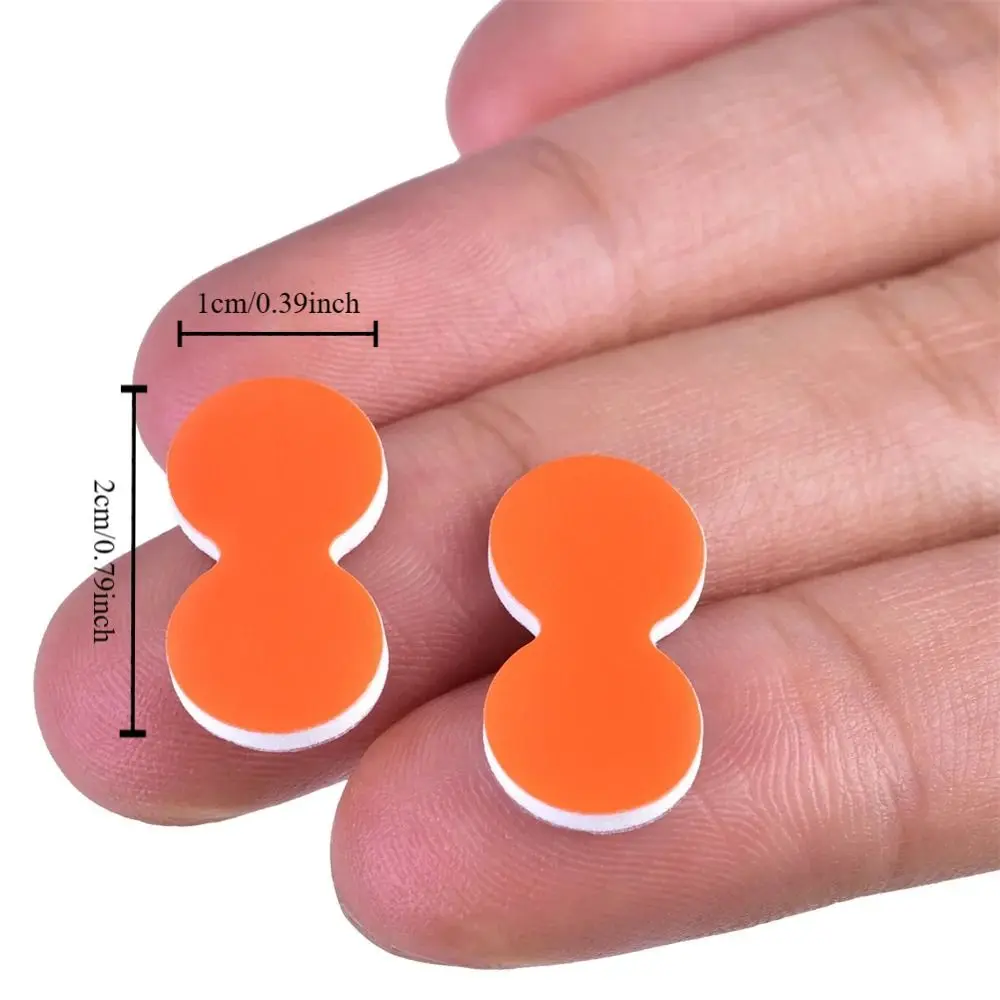 Dos botones de naranja que son 2