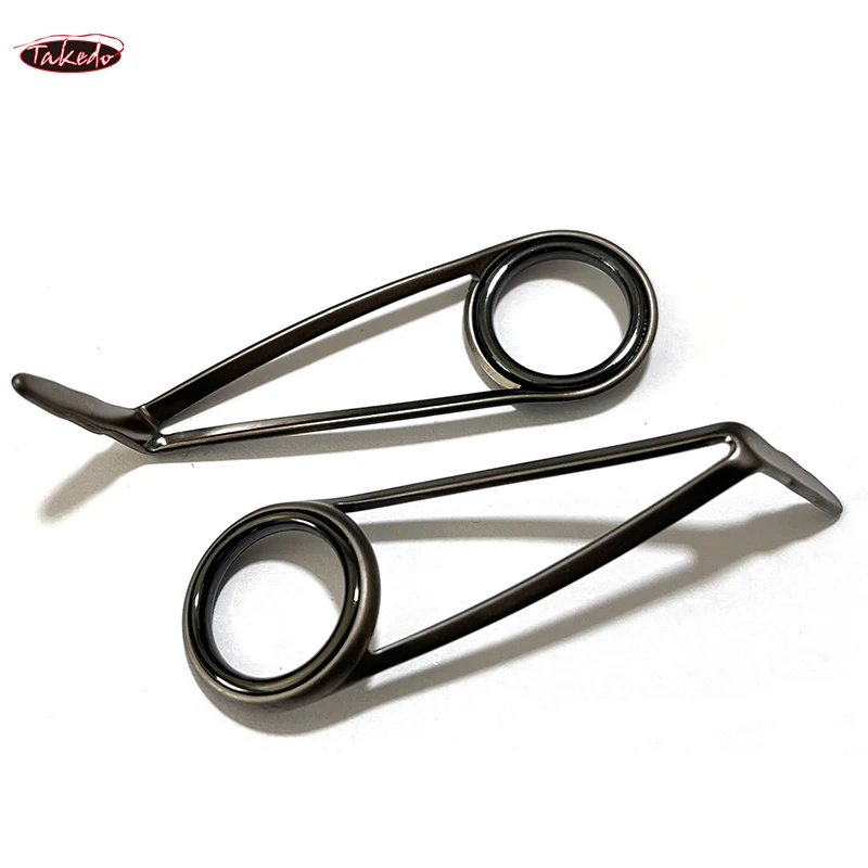 TAKEDO TN28 9 unids/caja guías de caña de pescar de acero inoxidable dos patas serie K marco fuerte guías de caña de pescar luz giratoria - imagen 5